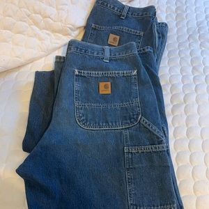 Two pair men carhartt carpenter jeans